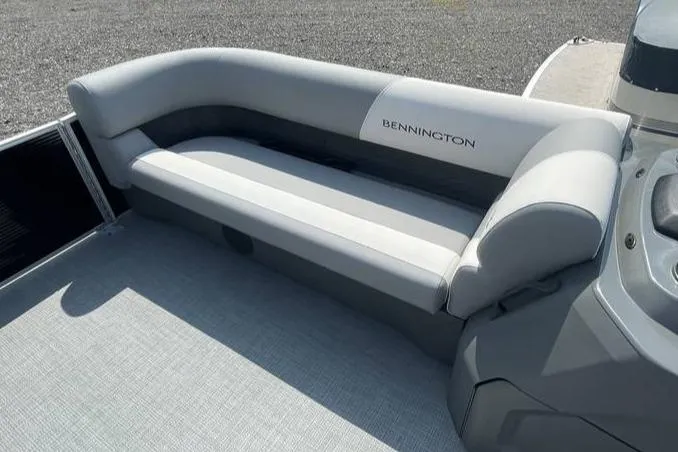 Slide: The Image of 2025 Bennington SLJSR boat seat with gray upholstery and sleek design. - 9