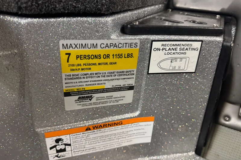 Slide: The Image of 2018 Ranger 621FS Fisherman boat capacity label, seating diagram, and safety warnings. - 11