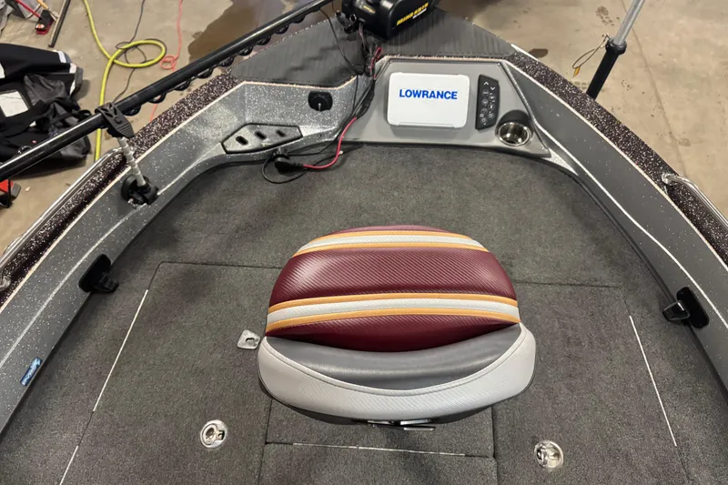 Slide: The Image of 2018 Ranger 621FS Fisherman boat interior with Lowrance system and cushioned seat. - 17