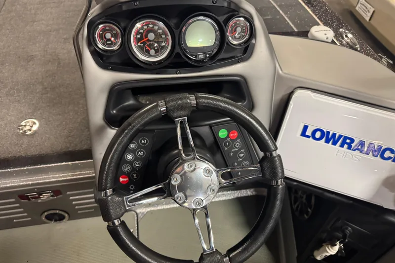 Slide: The Image of 2018 Ranger 621FS Fisherman dashboard with steering wheel and Lowrance HDS system. - 6