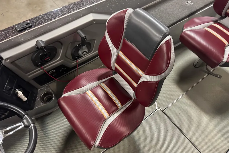 Slide: The Image of 2018 Ranger 621FS Fisherman boat interior with maroon and gray seating. - 9
