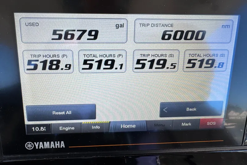 Slide: The Image of Yamaha display showing fuel usage and trip data for 2023 Pursuit S 328 Sport. - 6