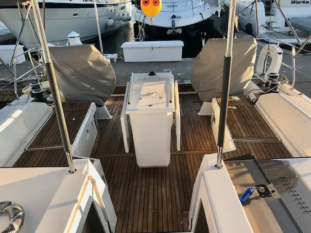 Slide: The Image of Beneteau Oceanis 46.1 yacht deck, 2023 model, featuring spacious seating and modern design. - 12