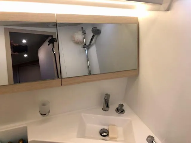 Slide: The Image of Bathroom interior of 2023 Beneteau Oceanis 46.1 yacht with modern fixtures. - 44