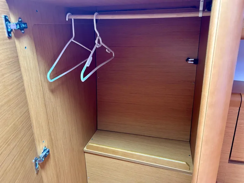 Slide: The Image of Empty wooden closet with hangers on Jeanneau 50 DS, 2012 model. - 27