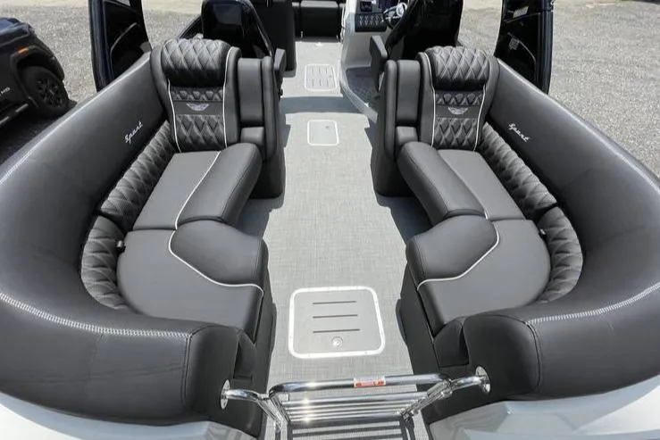 Slide: The Image of Luxurious interior of 2024 Bennington RFBASR boat with plush seating and modern design. - 8