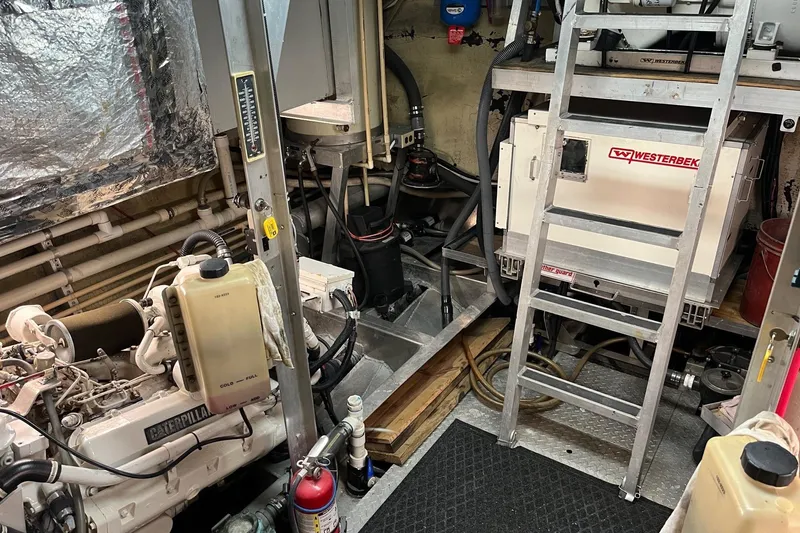 Slide: The Image of Engine room of 1997 Pluckebaum 60 Motor Yacht with Caterpillar engine and Westerbeke generator. - 9