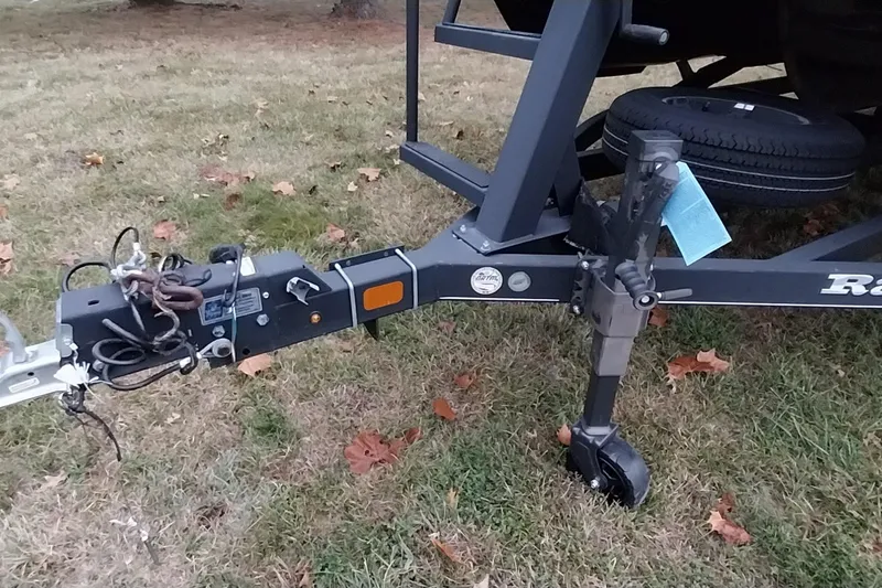 Slide: The Image of Trailer hitch of a 2020 Ranger 2500LS on grass with spare tire. - 19