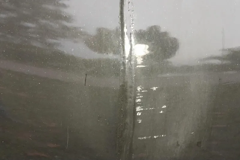 Slide: The Image of Reflection on a shiny surface of a 2020 Ranger 2500LS, showing blurred outdoor scenery. - 23