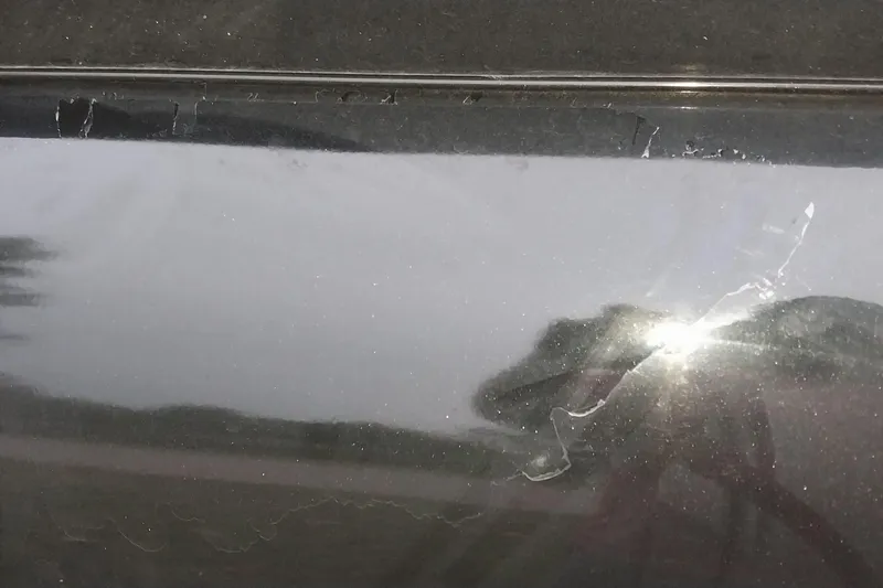 Slide: The Image of Close-up of a 2020 Ranger 2500LS with peeling paint and surface damage. - 30