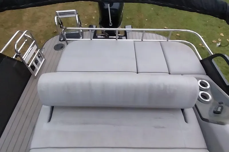 Slide: The Image of 2020 Ranger 2500LS boat with cushioned seating and stainless steel railings. - 43