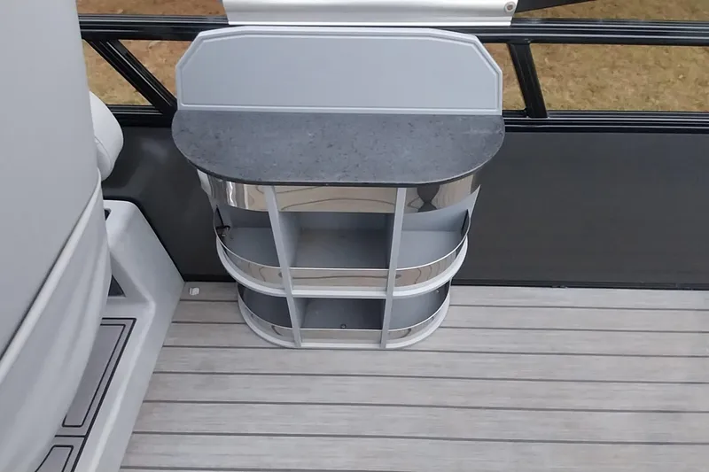 Slide: The Image of 2020 Ranger 2500LS boat interior with sleek storage unit and modern design. - 50