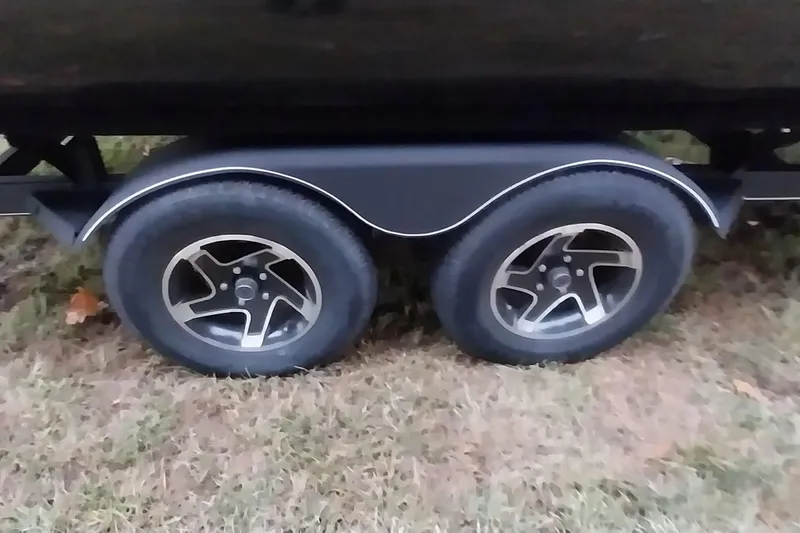 Slide: The Image of 2020 Ranger 2500LS trailer with dual wheels on grass. - 7