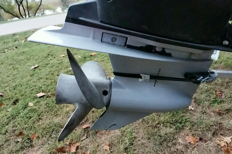 Slide: The Image of 2020 Ranger 2500LS boat propeller on grassy background. - 78