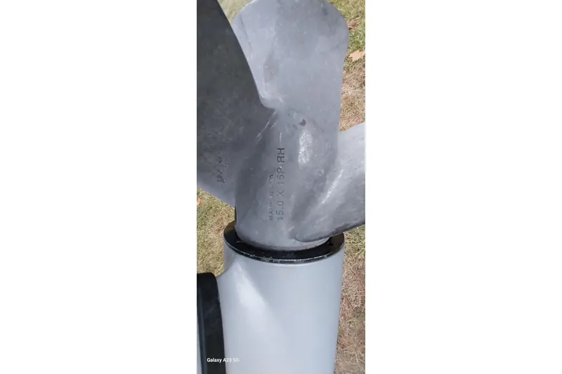 Slide: The Image of Close-up of a metal propeller on a 2020 Ranger 2500LS boat. - 80