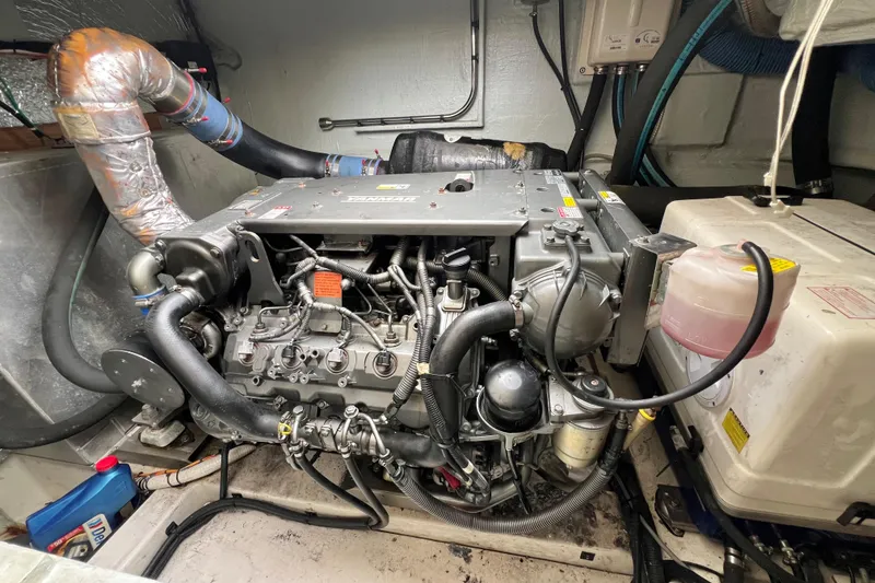 Slide: The Image of Engine room of a 2019 Aquila 44 with Yanmar engine and exhaust system. - 106