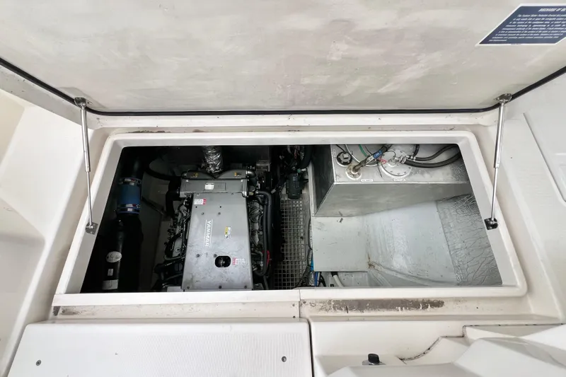 Slide: The Image of Engine compartment of 2019 Aquila 44 with generator and wiring. - 108