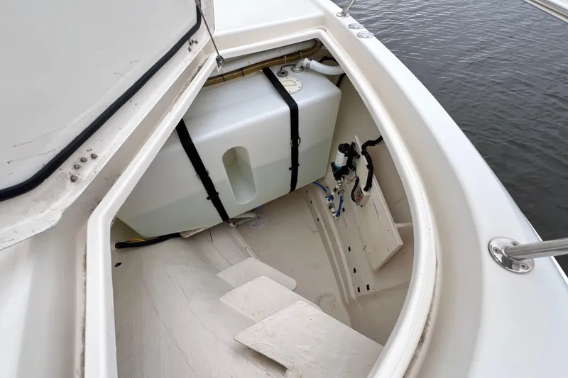 Slide: The Image of Anchor compartment of 2019 Aquila 44 boat with winch and ropes. - 117