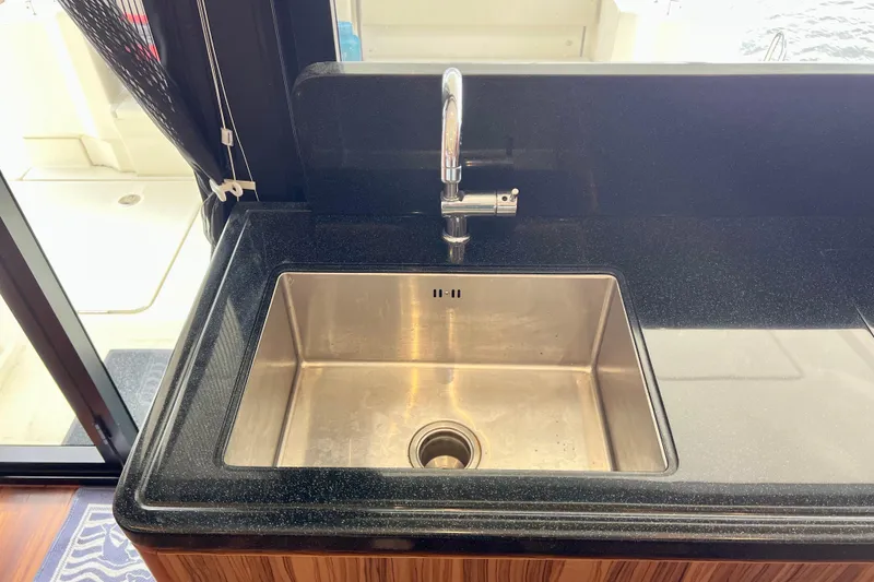 Slide: The Image of Stainless steel sink with modern faucet on Aquila 44 yacht, 2019 model. - 46