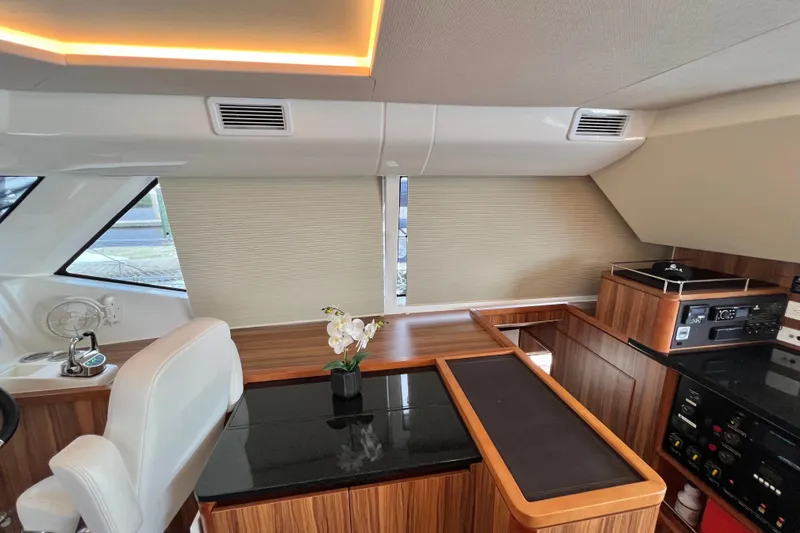 Slide: The Image of Luxurious interior of 2019 Aquila 44 yacht with elegant wood finish and modern amenities. - 60