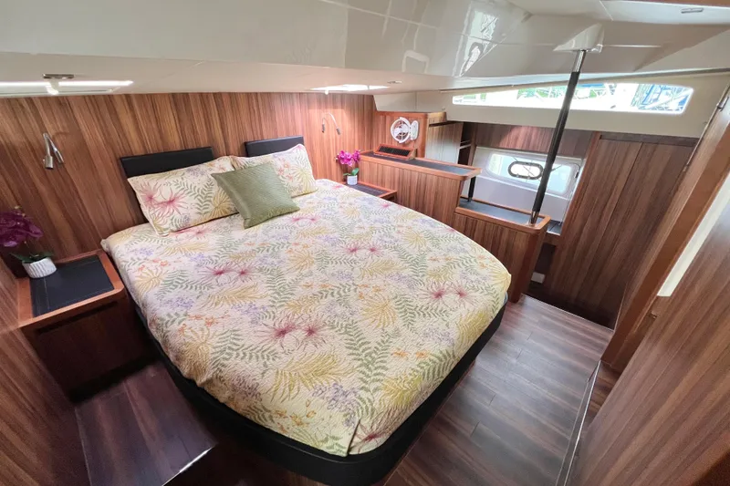 Slide: The Image of Interior of 2019 Aquila 44 yacht with modern helm and cozy cabin. - 69