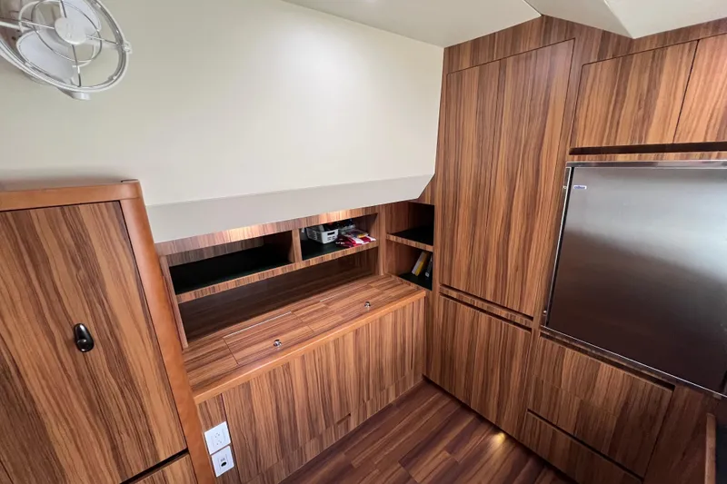 Slide: The Image of Luxurious interior of 2019 Aquila 44 yacht with wood paneling and modern design. - 94