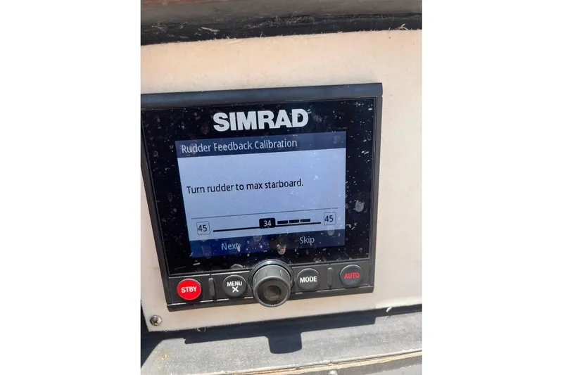 Slide: The Image of Simrad rudder calibration screen on 1980 Alden 44 sailboat, showing starboard adjustment. - 15