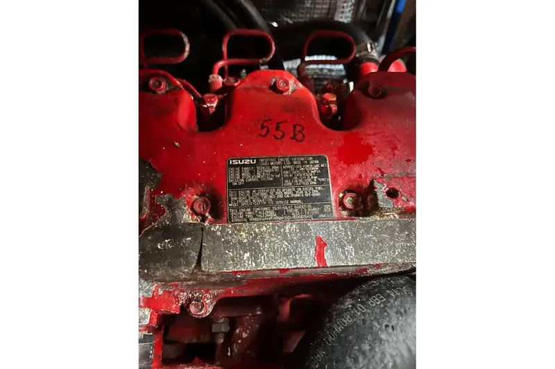 Slide: The Image of Red engine with Isuzu label, Alden 44 model, 1980. - 17