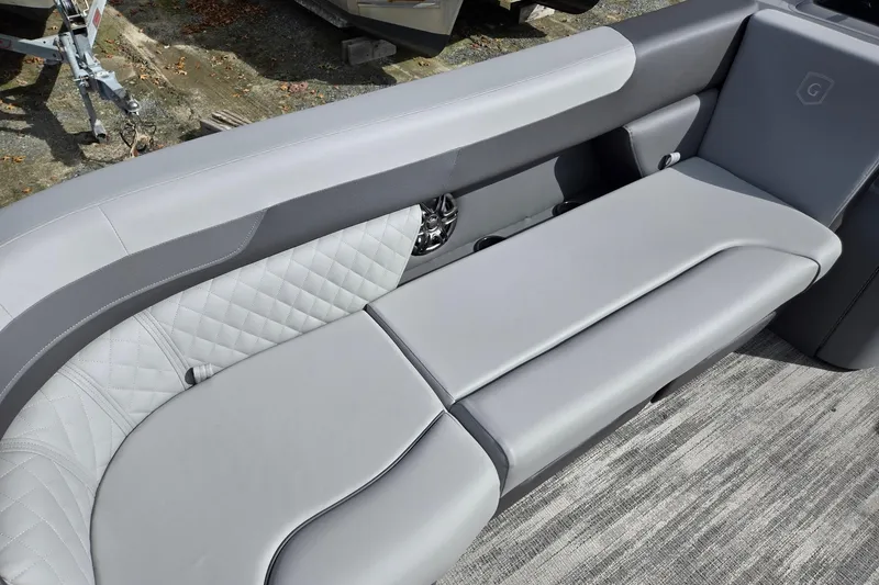Slide: The Image of Luxurious seating on 2026 Godfrey Sweetwater 2086 C pontoon boat, featuring elegant gray upholstery. - 10