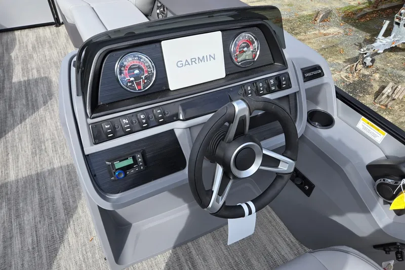Slide: The Image of Steering console of 2026 Godfrey Sweetwater 2086 C boat with Garmin display. - 15