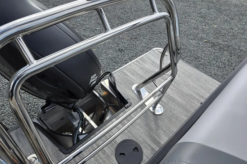 Slide: The Image of 2026 Godfrey Sweetwater 2086 C boat with sleek railing and motor detail. - 26