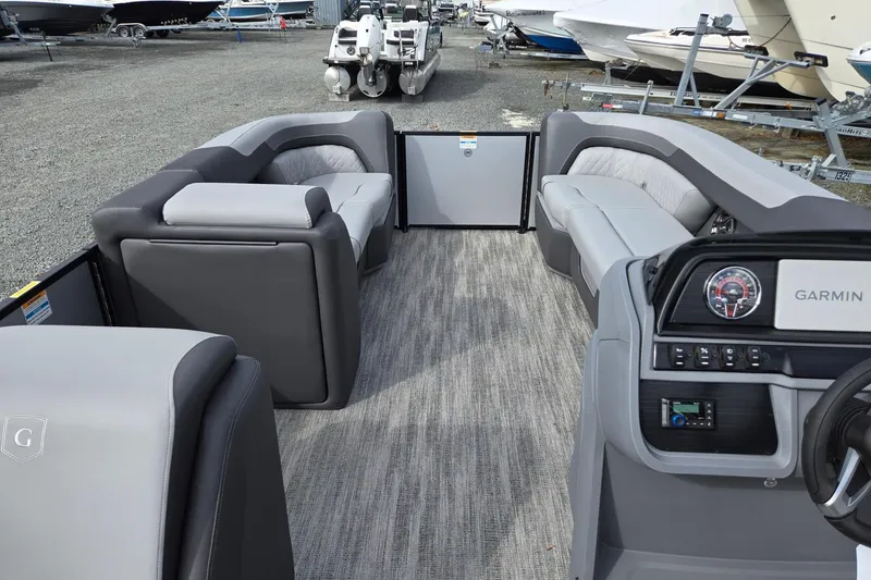 Slide: The Image of Interior of 2026 Godfrey Sweetwater 2086 C pontoon boat with modern seating and Garmin dashboard. - 30