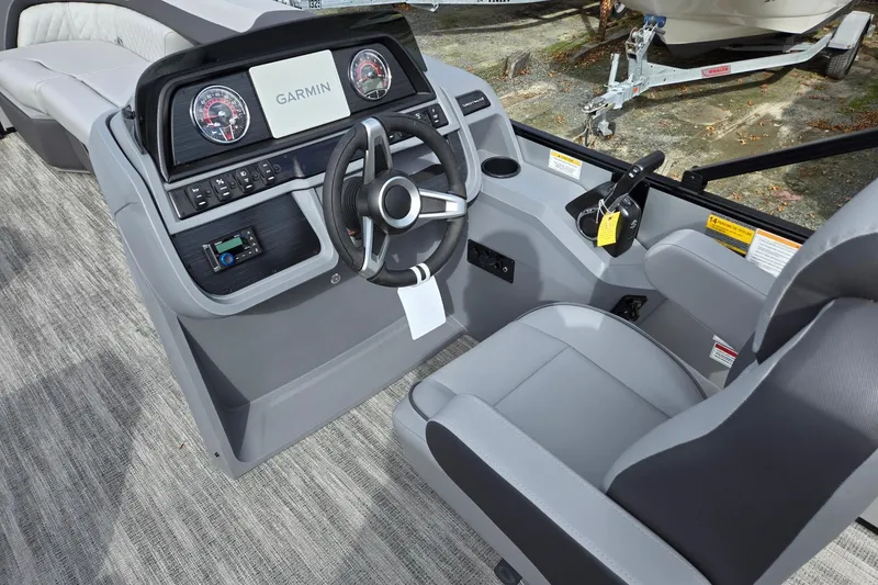 Slide: The Image of Interior of 2026 Godfrey Sweetwater 2086 C boat with modern steering console. - 31