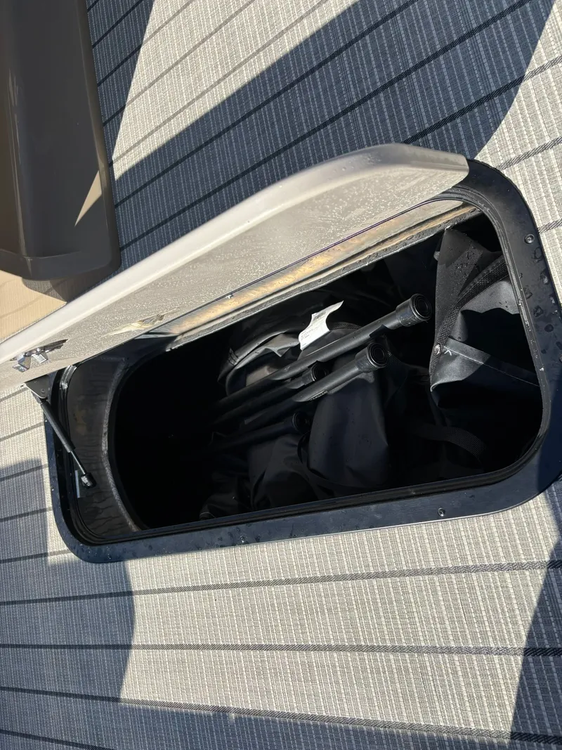 Slide: The Image of Viaggio V20C 2026 boat with open storage and seating area. - 17