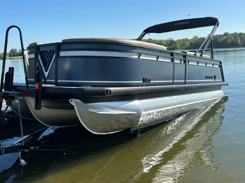 Slide: The Image of Viaggio V20C 2026 pontoon boat on calm water. - 4