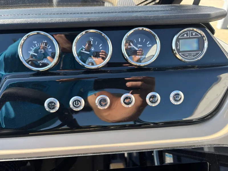 Slide: The Image of Viaggio V20C pontoon boat 2026 with Suzuki 150 engine at dock. - 6