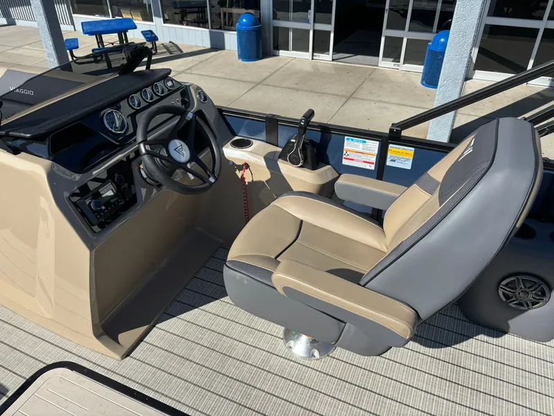 Slide: The Image of Viaggio V20C 2026 pontoon boat on trailer in daylight. - 9