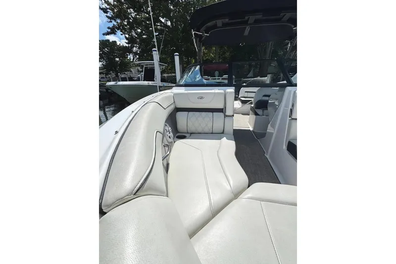 Slide: The Image of 2022 Regal LX2 boat interior with luxurious seating and modern design. - 46