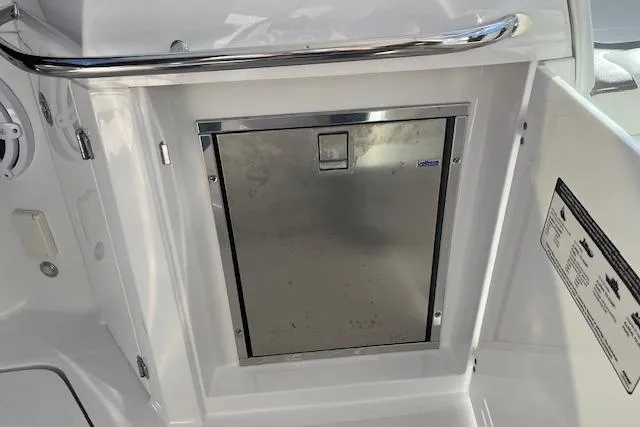 Slide: The Image of 2019 Monterey 355 Sport Yacht interior with stainless steel cabinet door. - 17