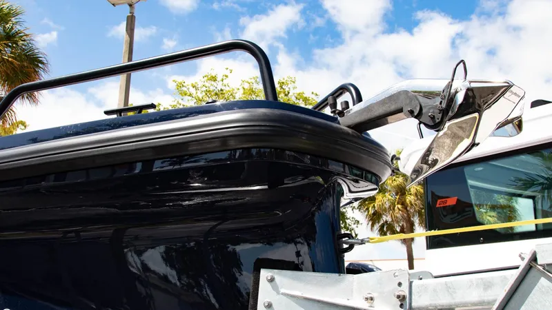 Slide: The Image of 2023 BRABUS Shadow 900 ST boat on a trailer under a blue sky. - 3