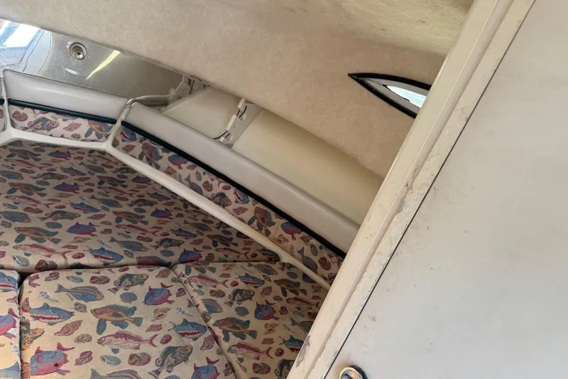 Slide: The Image of 1997 Hydra-Sports VECTOR 2650 WA cabin interior with fish-patterned upholstery. - 16