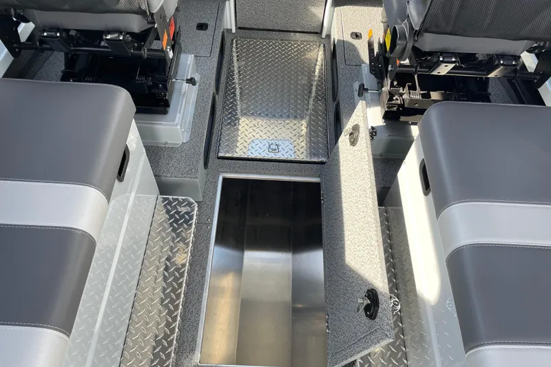 Slide: The Image of Interior of 2026 Hewescraft 270 ALASKAN ET HT boat with storage compartments. - 22