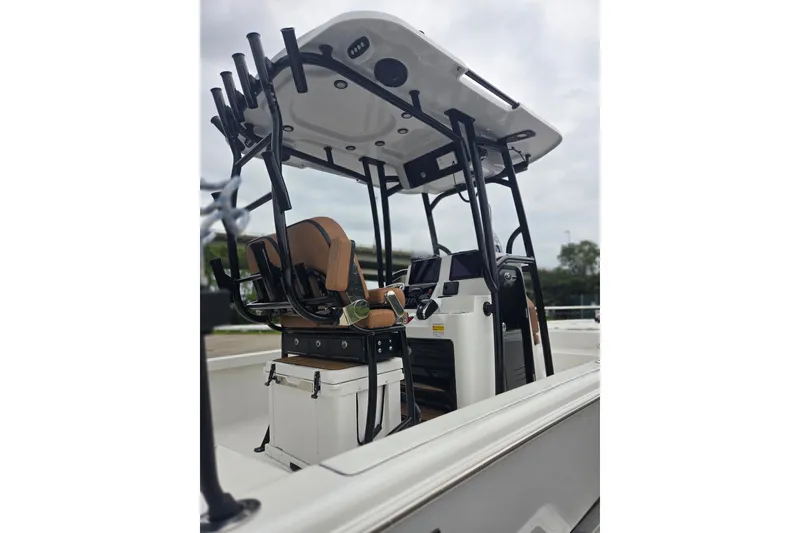 Slide: The Image of 2024 Sea Pro 250 Bay boat interior with modern console and seating. - 16