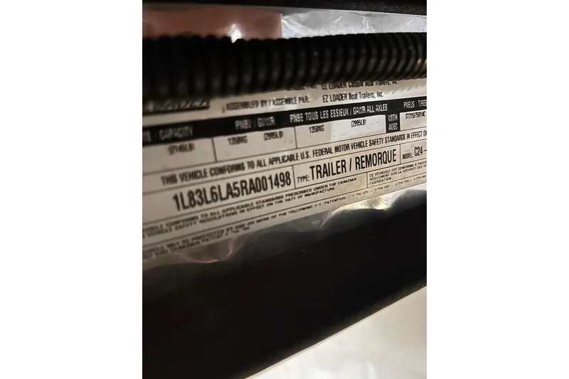 Slide: The Image of 2024 Triton 179 TrX trailer label with specifications and compliance details. - 19