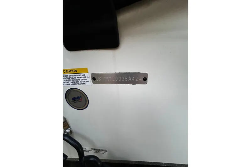 Slide: The Image of 2024 Triton 179 TrX boat identification plate with caution label and certification sticker. - 20