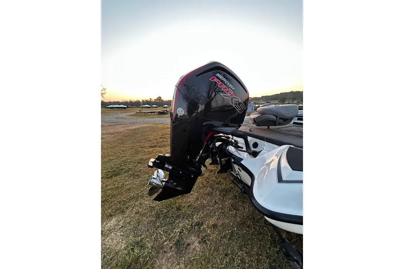 Slide: The Image of 2024 Triton 179 TrX boat with Mercury Pro XS engine at sunset. - 27