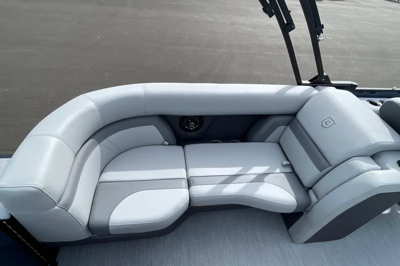Slide: The Image of Luxurious seating on 2026 Godfrey Monaco 235 SB pontoon boat, featuring sleek, modern design. - 10