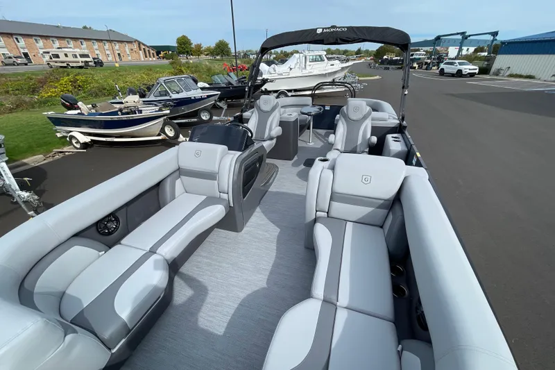 Slide: The Image of 2026 Godfrey Monaco 235 SB pontoon boat with spacious seating and modern design. - 7