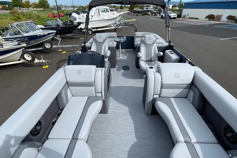 Slide: The Image of 2026 Godfrey Monaco 235 SB pontoon boat with luxurious seating and modern design. - 8