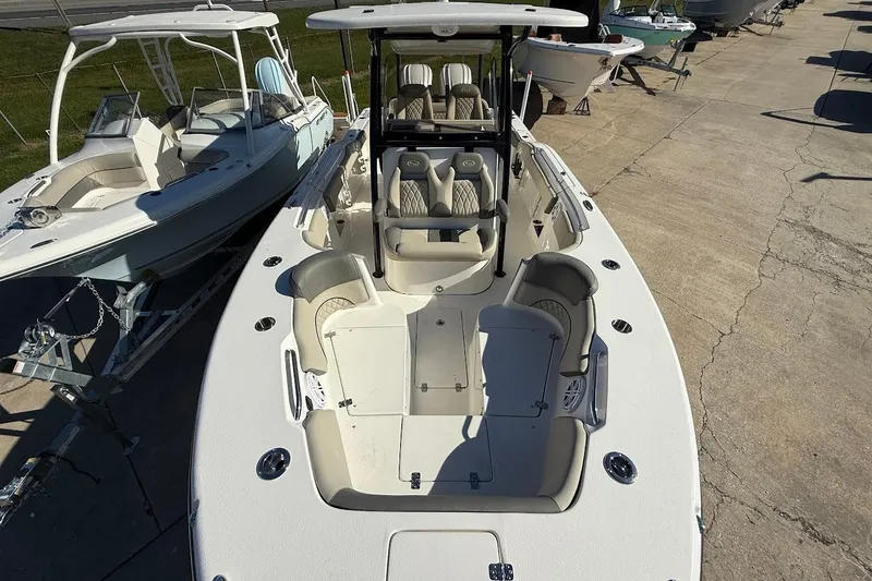 Slide: The Image of 2026 Key West 263 FS boat with spacious seating and modern design. - 19